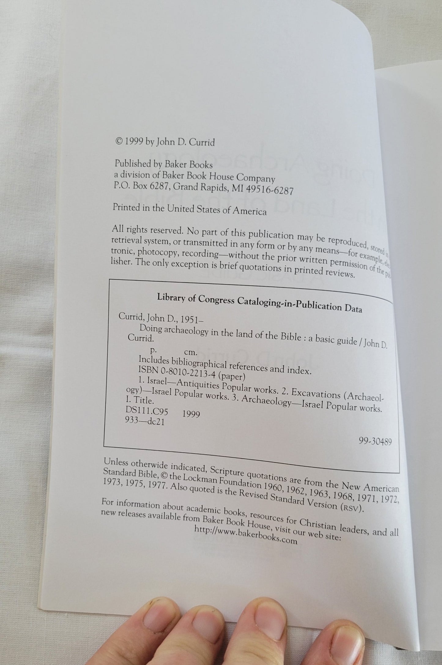 Used book “Doing Archaeology in the Land of the Bible: A Basic Guide” Written by John D. Currid. "A popular introduction to archaeology and the methods archaeologists use to reconstruct the history of ancient Israel." View of copyright info.